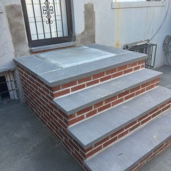 Phil Valenza Contracting - new bluestone and cement back porch - General Contractors Near Me - Whitestone, New York