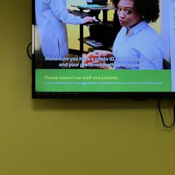 Quest Diagnostics - Waiting room TV with a message I now completely understand since their staff is so incompetent.