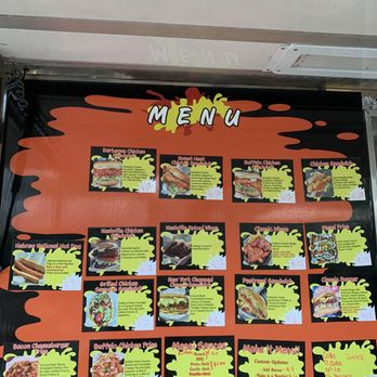 Messi Burgers - a menu on a window - Food Trucks Near Me Messi Burgers - a menu on a window - Food Trucks Near Me