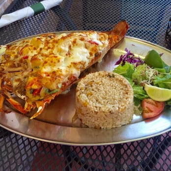 La Parrilla - 2.2 lbs lobster with shrimp and full of mozarella cheese, rice with amarillos, it was GREAT! DELICIOUS!!!!!! - Latin American Near Me - Luquillo, Puerto Rico La Parrilla - 2.2 lbs lobster with shrimp and full of mozarella cheese, rice with amarillos, it was GREAT! DELICIOUS!!!!!! - Latin American Near Me - Luquillo, Puerto Rico
