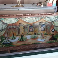 Hands On Watch & Clock Repair - Cool painting in his store.