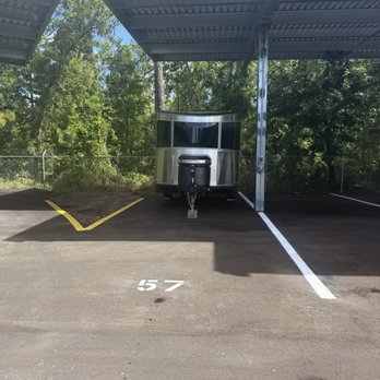 RecNation RV & Boat Storage - Camper parked at RecNation storage lot. - Self Storage Near Me - St Johns, Florida