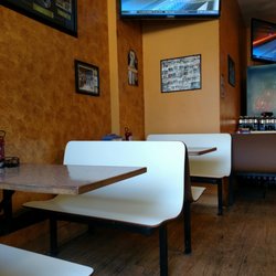 Primetime Pizza - Rustic inside,booths and TV's inside..air-condition also..