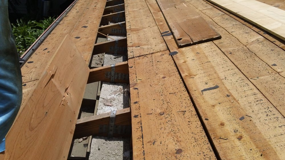 Slide of J K Behan Roofing