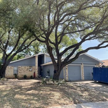 Good Guys Tree Service - Front view after trees were trimmed. Before they were hanging low touching the roof - Tree Services Near Me - Austin, Texas