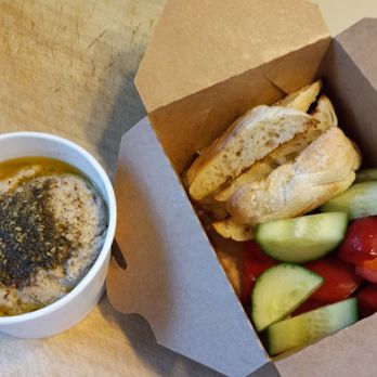 La Bodega - This white bean hummus!! Olive oil, lemon, sumac za'atar, roasted garlic, Aleppo pepper. Dippers: cucumber, bell pepper, bread. $8 - Chicken Shop Near Me - Dallas, Texas