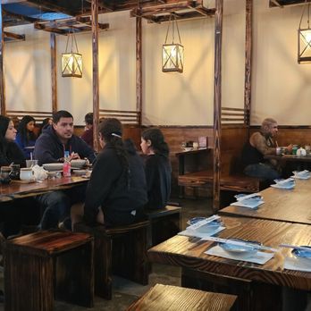 AJI Ramen - people sitting at tables in a restaurant - Ramen Near Me - Katy, Texas AJI Ramen - people sitting at tables in a restaurant - Ramen Near Me - Katy, Texas