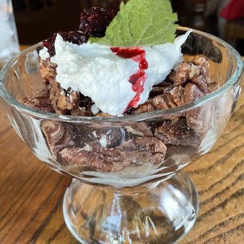 Robins Restaurant - Vegalicious Sundae (vanilla soy ice cream, raspberry coulis, almond milk ganache, coconut whipped cream, candied pecans) - New American Near Me - Cambria, California Robins Restaurant - Vegalicious Sundae (vanilla soy ice cream, raspberry coulis, almond milk ganache, coconut whipped cream, candied pecans) - New American Near Me - Cambria, California