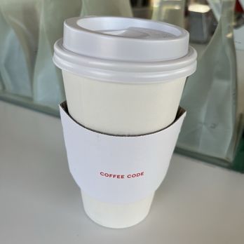 Coffee Code Espresso Bar - Large Hot Spanish Latte, with oat milk, less sweet - Coffee & Tea Near Me - Fullerton, California