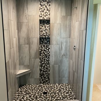 Shamrock Tile - a walk in shower with a bench - General Contractors Near Me Shamrock Tile - a walk in shower with a bench - General Contractors Near Me