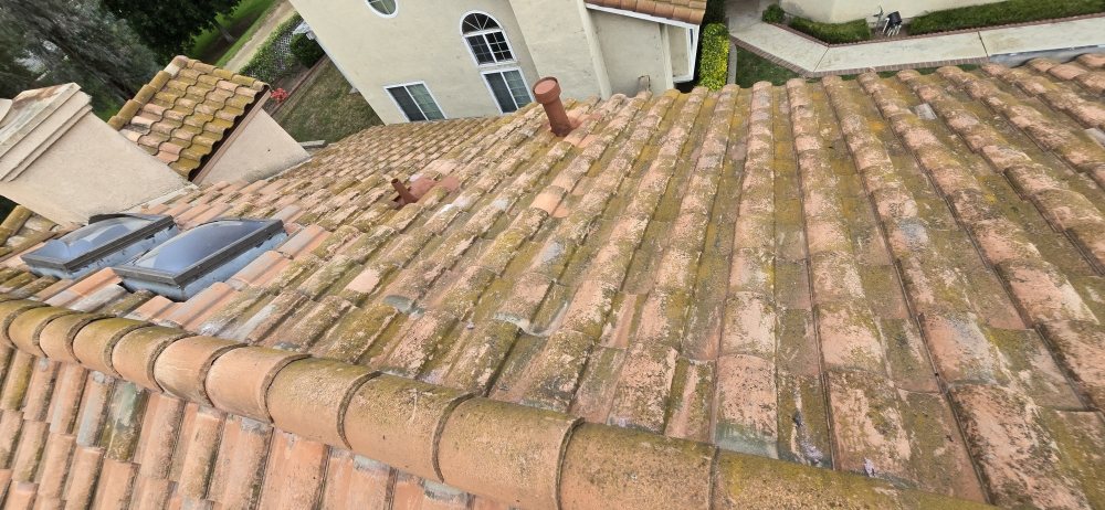 Slide of Kalli Roofing