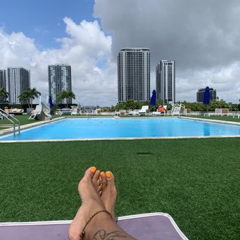 Hilton Miami Downtown - View from pool...self serve towel service and the rain was so warm - Hotels Near Me - Miami, Florida