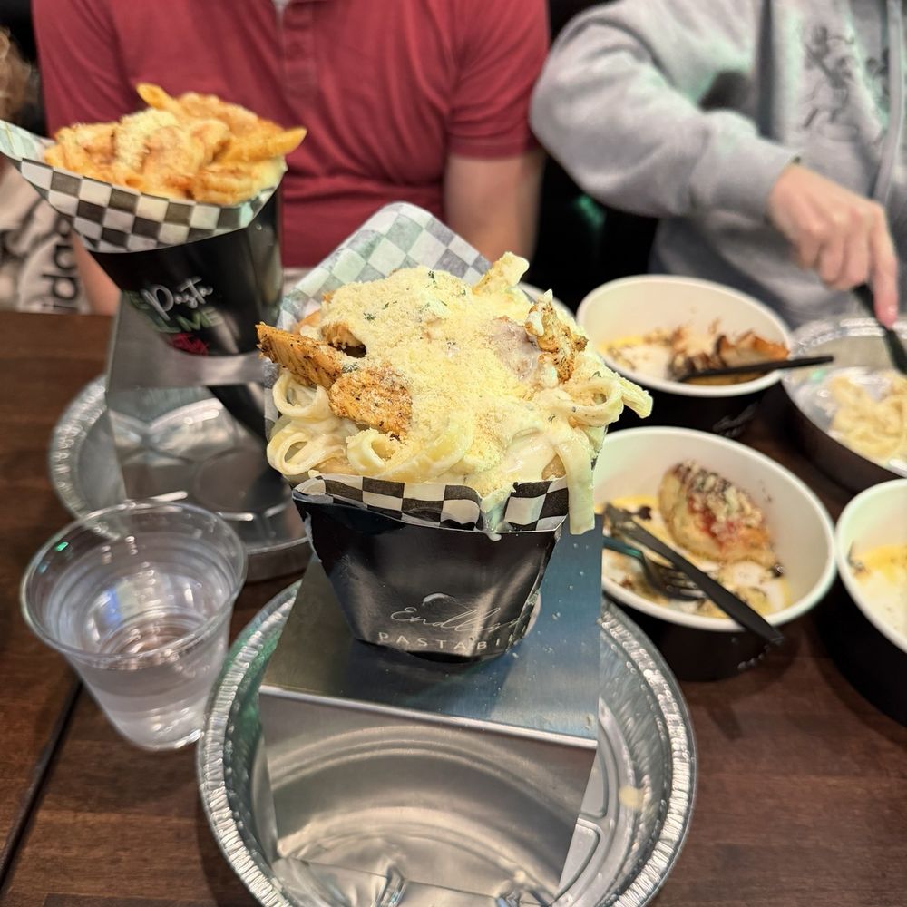 Endless Pastabilities - Fettuccini Alfredo grilled chicken in a bread cone. - Italian Near Me - Las Vegas, Nevada Endless Pastabilities - Fettuccini Alfredo grilled chicken in a bread cone. - Italian Near Me - Las Vegas, Nevada