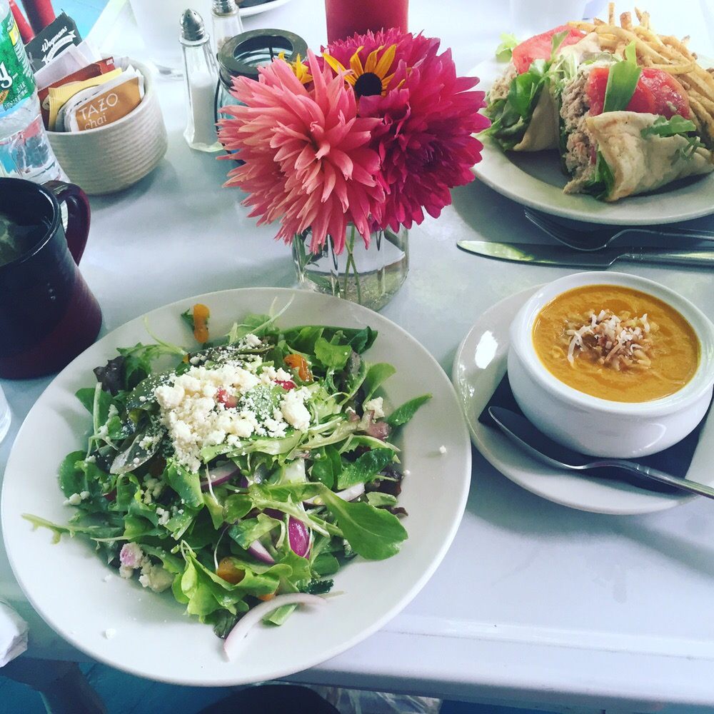 Roots Cafe - Carrot ginger and toasted coconut soup with a Salad of the Day: apricots, strawberries, feta and a lemon herb vinaigrette - New American Near Me - Naples, New York Roots Cafe - Carrot ginger and toasted coconut soup with a Salad of the Day: apricots, strawberries, feta and a lemon herb vinaigrette - New American Near Me - Naples, New York