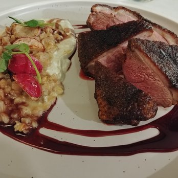 The Circle - Roasted duck breast with farro risotto and a pomegranate glaze - New American Near Me - Fredon Township, New Jersey The Circle - Roasted duck breast with farro risotto and a pomegranate glaze - New American Near Me - Fredon Township, New Jersey