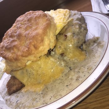 Pine State Biscuits - Reno - The Reggie with a fried egg that gravy is extra country just like my soul - Breakfast & Brunch Near Me - Reno, Nevada