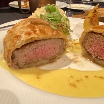 Ciao - The Beef Wellington was perfectly cooked and nicely paired with the truffle hollandaise. - Bars Near Me - Wausau, Wisconsin