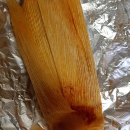 a close up of a tamales a close up of a tamales