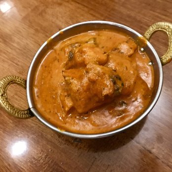 Maya Da Dhaba - Butter Chicken cooked in a rich creamy, tomato based sauce with fragrant spices and finished with a drizzle of cream. - Indian Near Me - Surry Hills, NSW