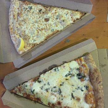 Lazy Moon Pizza - The Saganaki Pizza Slice and Tomato Base (Includes Mozzarella) Slice with Fresh Mozzarella and Basil as toppings - Pizza Near Me - Orlando, Florida