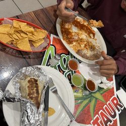 Agave Restaurant - Breakfast burrito . Chicken enchiladas. Chips and salsa . Yummy goodness