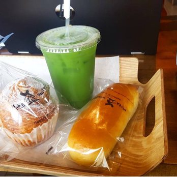 White Windmill Bakery - Matcha Iced Latte was high quality and the Boston Cream Croissant was as yummy as it was pretty!! The other bun was good too. - Bakeries Near Me - Duluth, Georgia