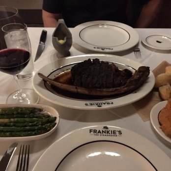 Frankie's The Steakhouse - Tomahawk stake for two and grilled asparagus. - Steakhouses Near Me - Duluth, Georgia Frankie's The Steakhouse - Tomahawk stake for two and grilled asparagus. - Steakhouses Near Me - Duluth, Georgia
