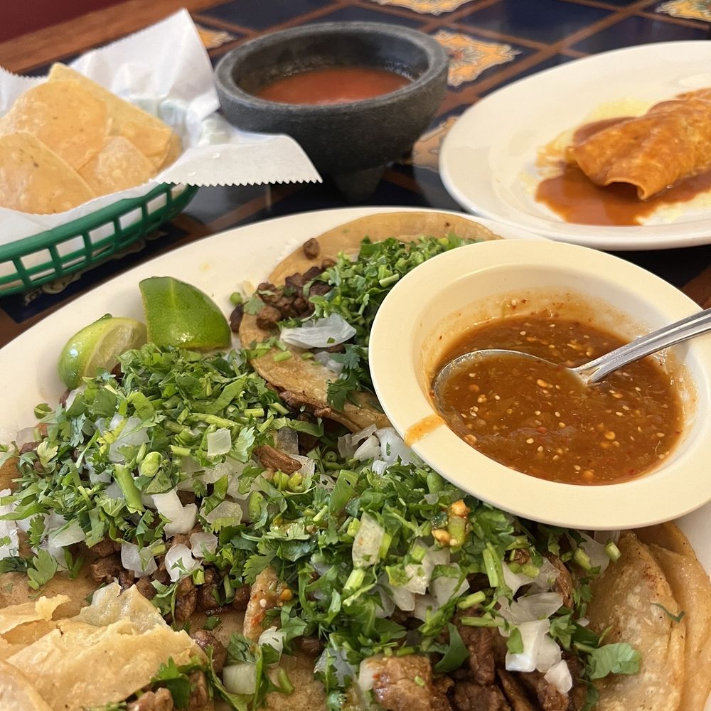 Beef street tacos and chicken enchilada.
