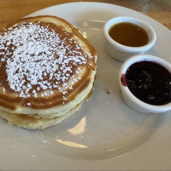 Clinton St. Baking - Regular Pancakes with Warm Maple Butter and blueberry on side - Bakeries Near Me - New York, New York Clinton St. Baking - Regular Pancakes with Warm Maple Butter and blueberry on side - Bakeries Near Me - New York, New York