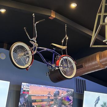 Wakesurf Saloon - Bike hanging - Sports Bars Near Me - Austin, Texas Wakesurf Saloon - Bike hanging - Sports Bars Near Me - Austin, Texas