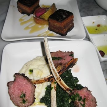 Buceo 95 - pork belly dish and a lamp chop dish - Tapas Bars Near Me - New York, New York