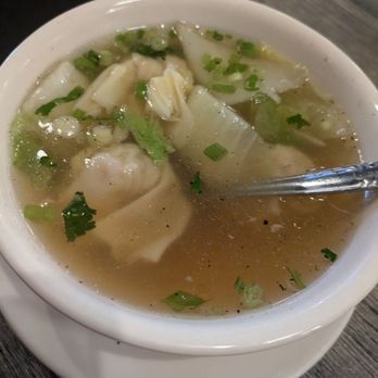 Ocean Wave - Wonton Soup - Shrimp and chicken stuffed wontons ina flavorful soup broth with napa cabbage, garnished with, scallions + cilantro - Sushi Bars Near Me - Atlanta, Georgia Ocean Wave - Wonton Soup - Shrimp and chicken stuffed wontons ina flavorful soup broth with napa cabbage, garnished with, scallions + cilantro - Sushi Bars Near Me - Atlanta, Georgia