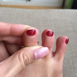 Bad toenail shaping!! Literally looks like she cut a straight line and didn't file it down at all to even it out.