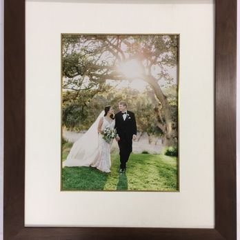 Feeling Frameous - Wedding photo framed in solid walnut, fabric mat, and silver leaf fillet. - Framing Near Me - Studio City, California