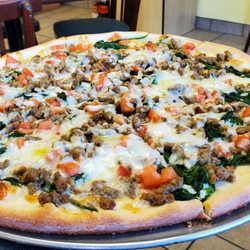 Tonys Pizza - My usual - Mediterranean pizza, hold the feta, add ground Italian sausage.