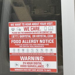 a warning sign in a window a warning sign in a window