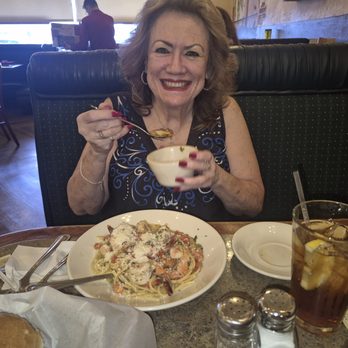 Spaghetti Eddie's Cucina Italiana - Susan, enjoying her Shrimp Scampi and cup of hot Minestroni soup. - Italian Near Me - Glendora, California Spaghetti Eddie's Cucina Italiana - Susan, enjoying her Shrimp Scampi and cup of hot Minestroni soup. - Italian Near Me - Glendora, California