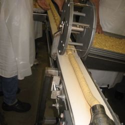 The Original Zwolle Tamales - Cutting tamales to size