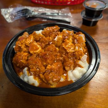 Brother Cluckers - Fried chicken tossed in hot buffalo sauce over mac - Seafood Near Me - Kernersville, North Carolina