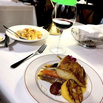 The Magic Lamp Inn - Sea bass and a side of lobster Mac and cheese - Steakhouses Near Me - Rancho Cucamonga, California The Magic Lamp Inn - Sea bass and a side of lobster Mac and cheese - Steakhouses Near Me - Rancho Cucamonga, California