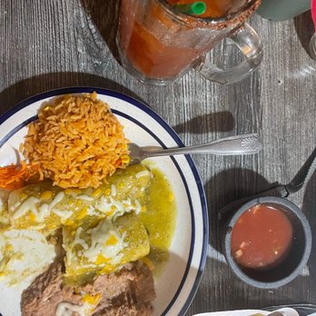 Mariachi's Authentic Mexican Restaurant - Chili verde enchilada and michelada (chefs kiss) - Mexican Near Me - Kapaa, Hawaii Mariachi's Authentic Mexican Restaurant - Chili verde enchilada and michelada (chefs kiss) - Mexican Near Me - Kapaa, Hawaii
