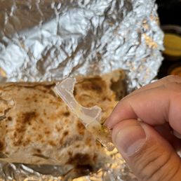 The large piece of plastic in my burrito The large piece of plastic in my burrito