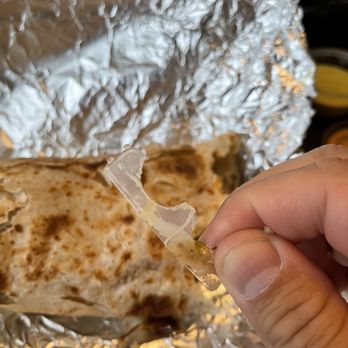 Rancho's Taquieria - The large piece of plastic in my burrito - Mexican Near Me - Dickinson, Texas Rancho's Taquieria - The large piece of plastic in my burrito - Mexican Near Me - Dickinson, Texas