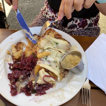 Rheinblick German Restaurant - Chicken schnitzel with apple and brie, potato pancakes on the side - German Near Me - Canandaigua, New York Rheinblick German Restaurant - Chicken schnitzel with apple and brie, potato pancakes on the side - German Near Me - Canandaigua, New York