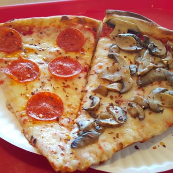 Milano’s Pizza - Slice of pepperoni and mushroom - Pizza Near Me - Memphis, Tennessee Milano’s Pizza - Slice of pepperoni and mushroom - Pizza Near Me - Memphis, Tennessee