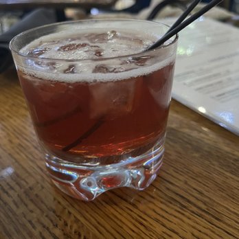 Rick's Café Boatyard - EVENING HONEY Woodford Reserve Bourbon, Huber Applejack, Smoked Honey, Campari, Sweet Vermouth, Dried Orange Garnish - American Near Me - Indianapolis, Indiana Rick's Café Boatyard - EVENING HONEY Woodford Reserve Bourbon, Huber Applejack, Smoked Honey, Campari, Sweet Vermouth, Dried Orange Garnish - American Near Me - Indianapolis, Indiana