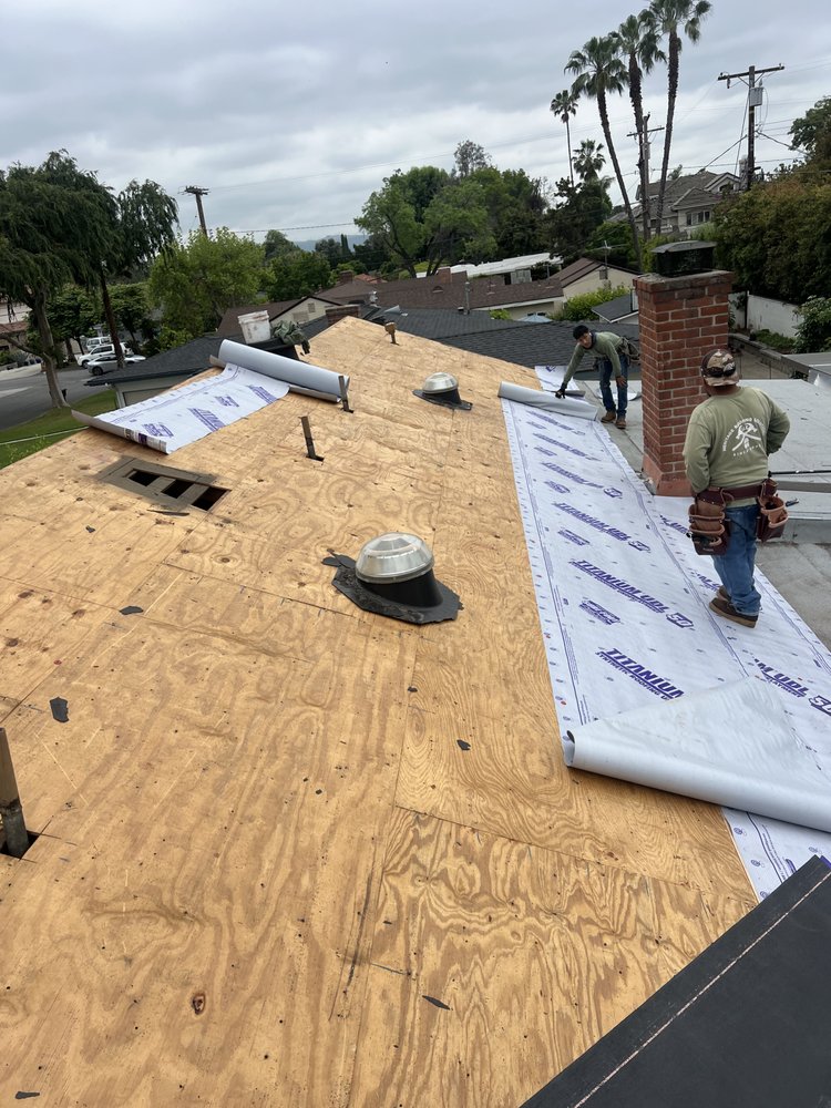 Slide of Heritage Roofing Solutions