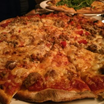 Novara Restaurant - Cacciatore pizza. Has sausage and onions. Nothing great - Italian Near Me - Milton, Massachusetts Novara Restaurant - Cacciatore pizza. Has sausage and onions. Nothing great - Italian Near Me - Milton, Massachusetts