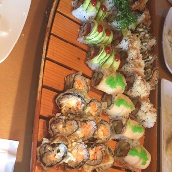 Wasabi Restaurant - Sushi boat my favorite are the North Carolina and naughty girl also they have buy one get one free! - Sushi Bars Near Me - Cary, North Carolina Wasabi Restaurant - Sushi boat my favorite are the North Carolina and naughty girl also they have buy one get one free! - Sushi Bars Near Me - Cary, North Carolina