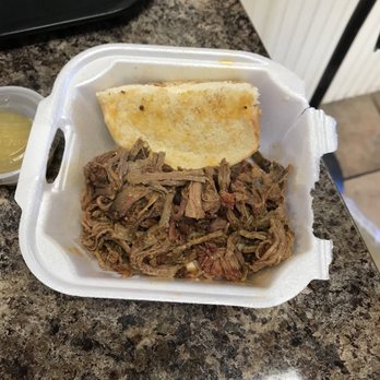 Puny John's BBQ - 1/2 of the brisket sandwich - Barbeque Near Me - Tombstone, Arizona Puny John's BBQ - 1/2 of the brisket sandwich - Barbeque Near Me - Tombstone, Arizona